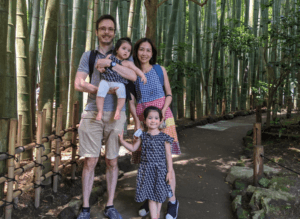 Andre and family on a garden path