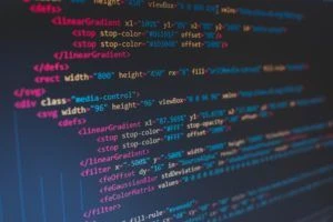 Close up of a computer screen displaying lines of HTML code