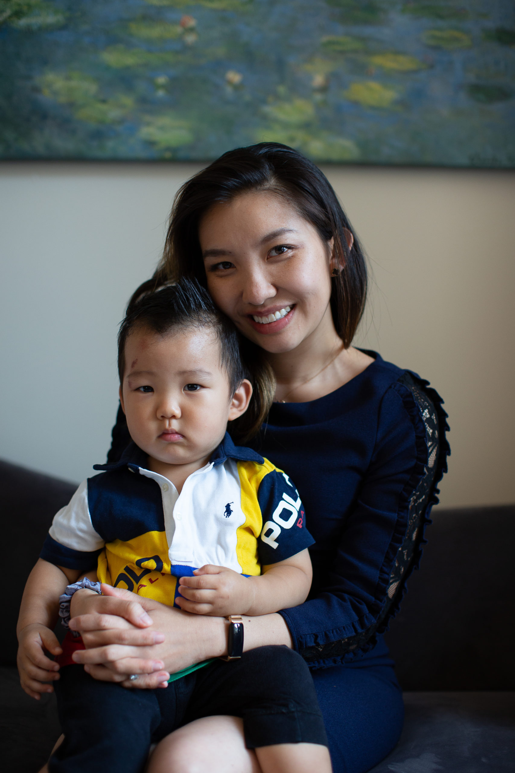 helloava founder sitting with young son