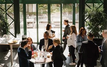Office social event with people interacting