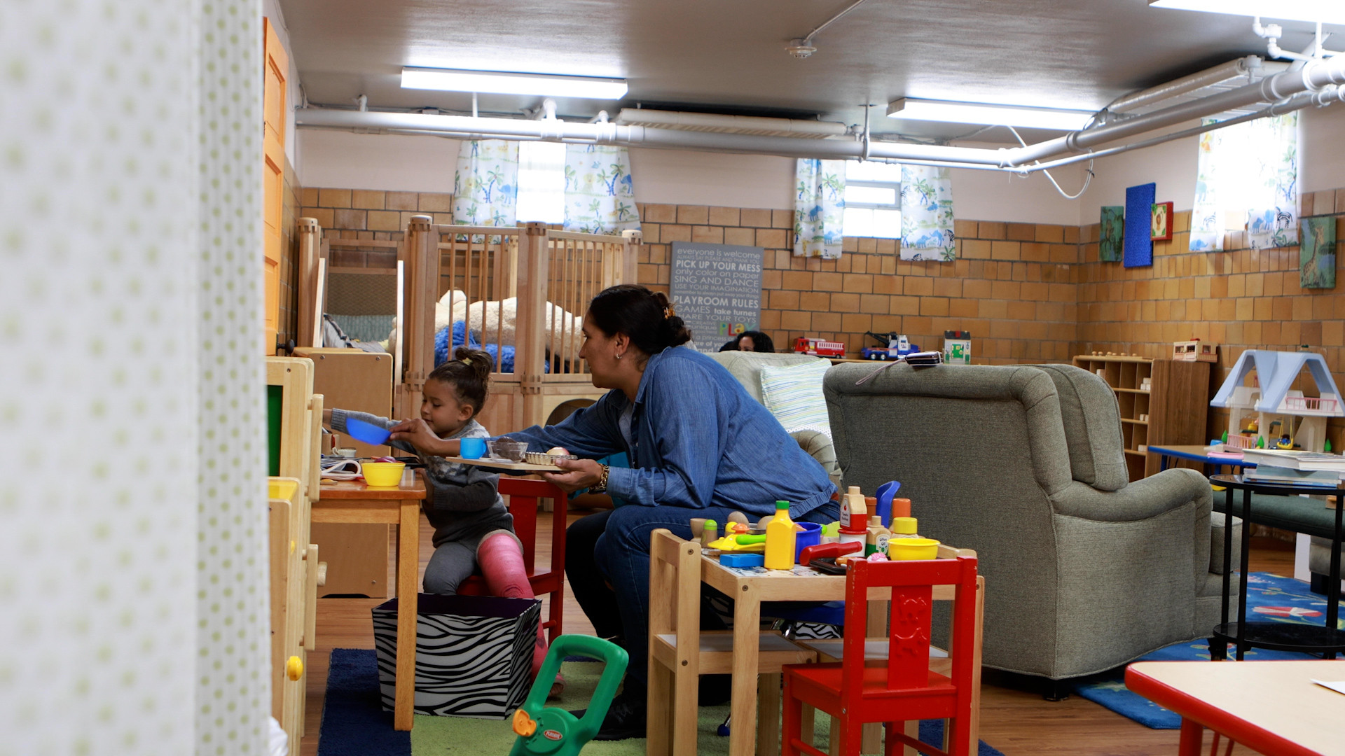 brilliant detroit employee teaching a young child