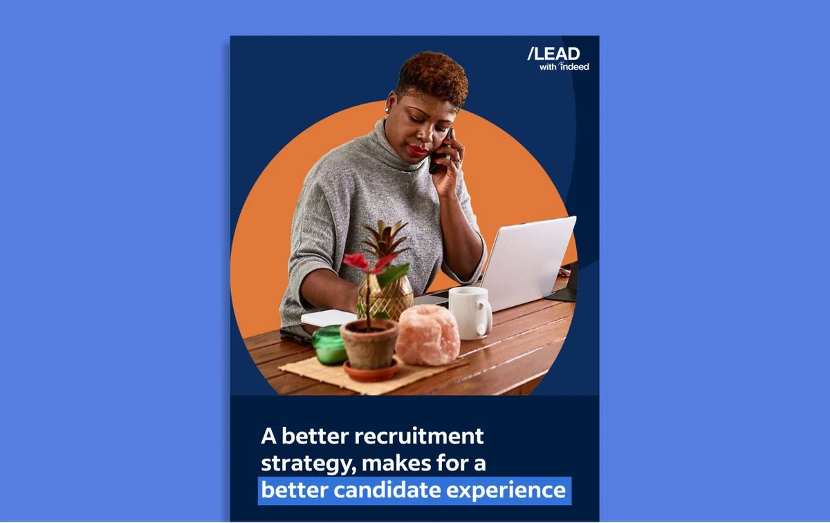 Cover Image of eGuide depicting a woman at work with her laptop and cell phone.