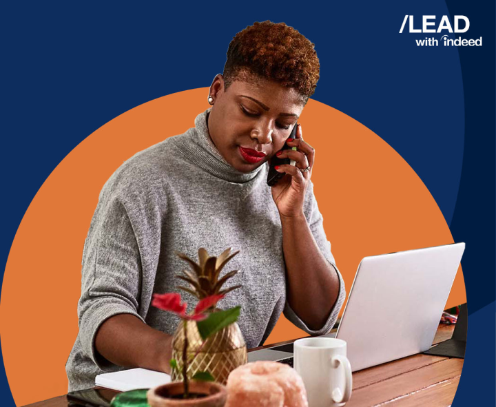 Cover Image of eGuide depicting a woman at work with her laptop and cell phone.