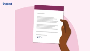 An employer sitting working at their computer