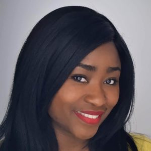 Stacy smiling for a photo