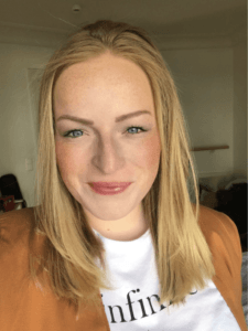 Lena smiling for a photo