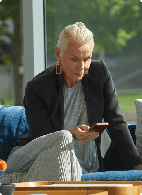 middle age woman using mobile phone