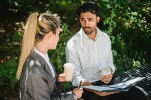 Man and woman having an outdoor meeting