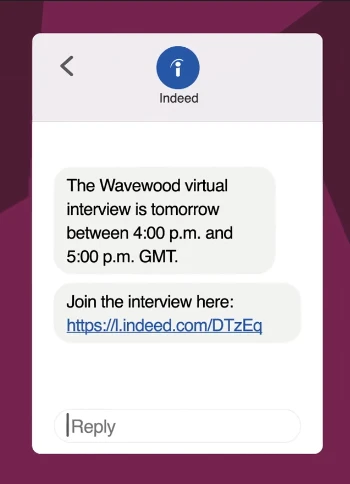 An automated SMS reminder sent via Indeed video recruitment software featuring a direct link for candidates to join a session on mobile.