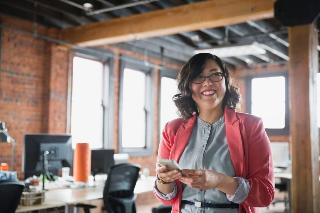 Attract quality: Happy employer using recruiting solutions to attract the right candidates