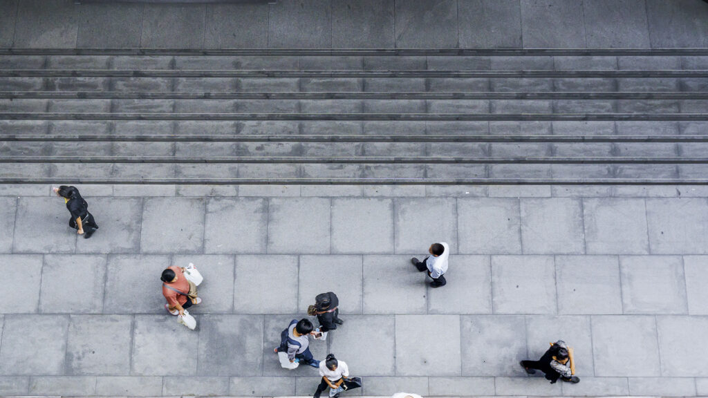 Aerial view of people on a sidewalk