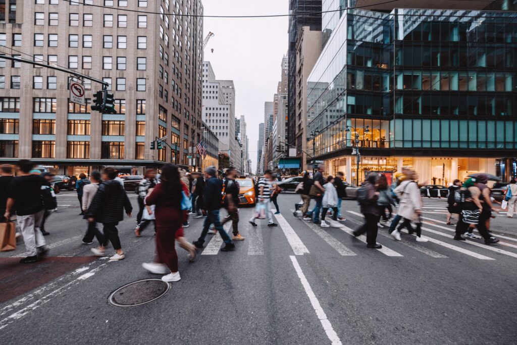 Crowd of people crossing the street in NYC