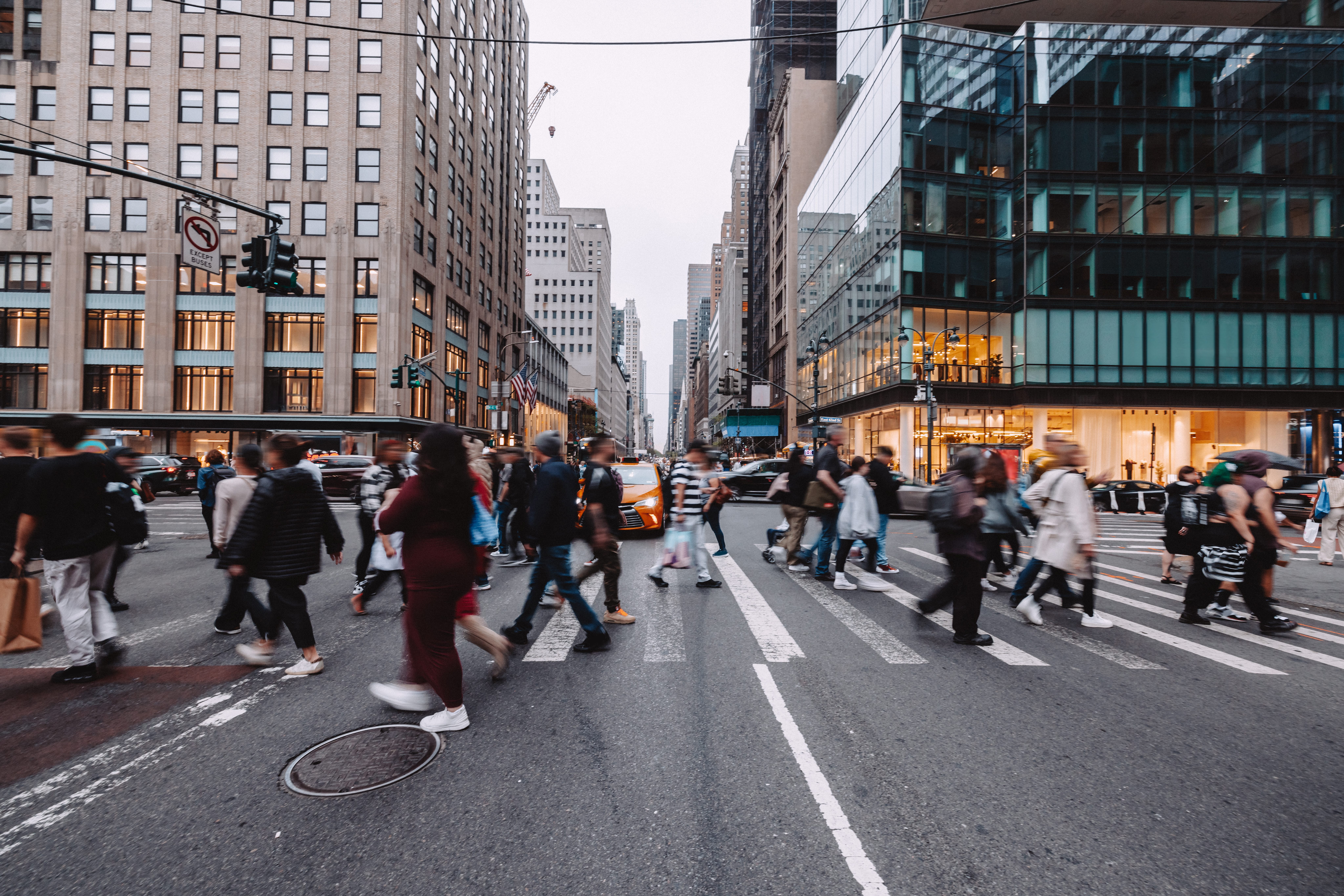 Crowd of people crossing the street in NYC