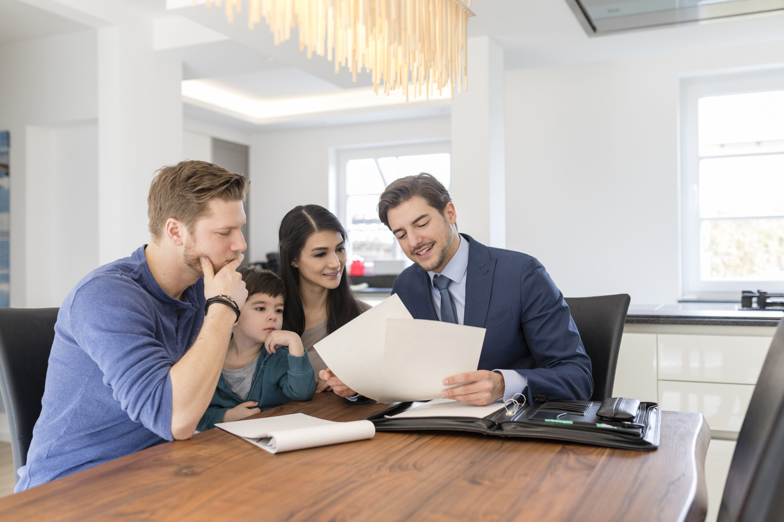 Family reviewing finances at home