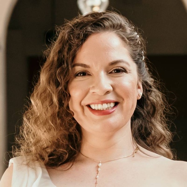 Headshot photo of Jacqueline Sandoval looking at the camera