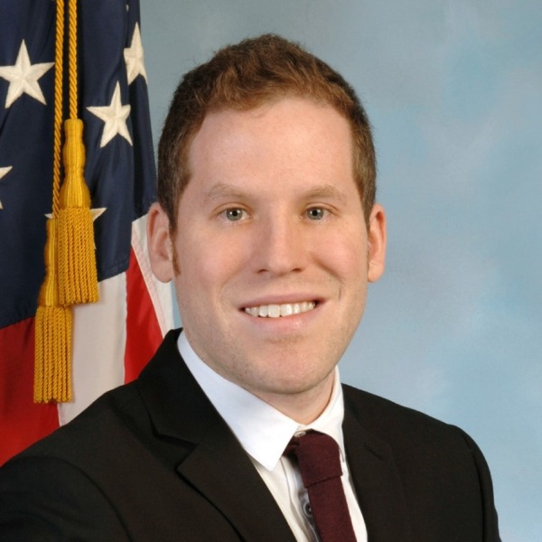 Headshot photo of Andrew Lamkay looking at the camera