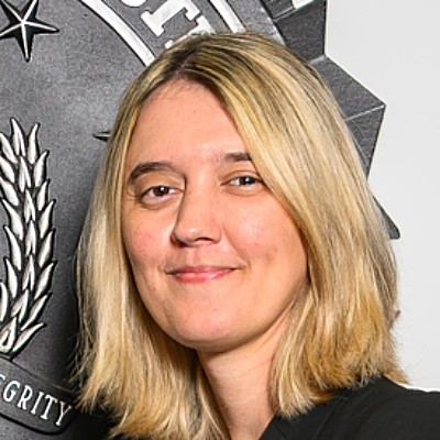Headshot photo of Gracie Bayliss looking at the camera