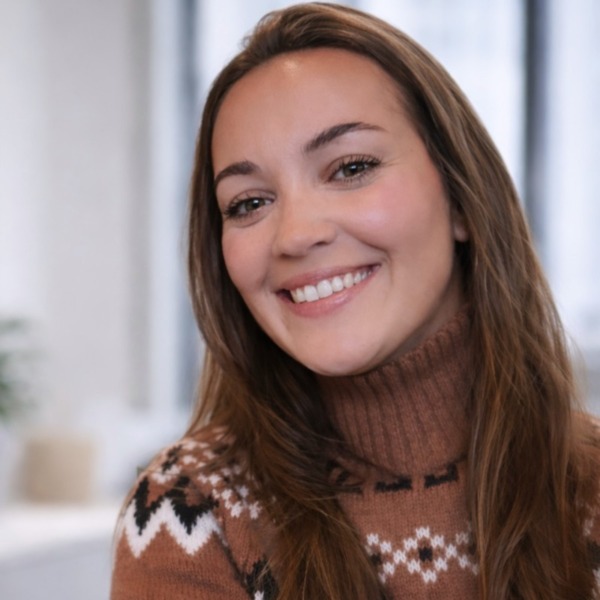 Headshot photo of Kirsten Albano looking at the camera